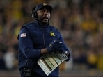 Sherrone Moore of the Michigan Wolverines calls a timeout during the first half in a game against the Purdue Boilermakers Sherrone Moore of the Michigan Wolverines calls a timeout during the first half in a game against the Purdue Boilermakers