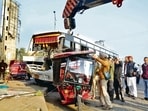 The damaged vehicles being removed from the mishap site outside the interstate bus stand in Ludhiana on Thursday. (Manish/HT)