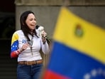 María Corina Machado speaking at an event.