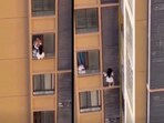 Desperate escape from 10th-floor apartment goes viral as woman avoids being discovered by man’s wife in Guangdong