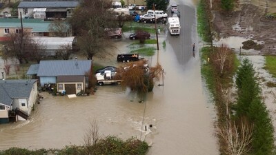 A drone view shows a person stranded in an area flooded by the Wallace River, as an atmospheric river brings rain and flooding to the Pacific Northwest, in Gold Bar, Washington, U.S., December 10, 2025.  REUTERS/David Ryder (REUTERS)