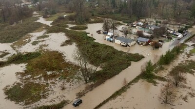 A drone view shows a vehicle stranded in an area flooded by the Wallace River on December 10, 2025. (REUTERS/David Ryder) (REUTERS)