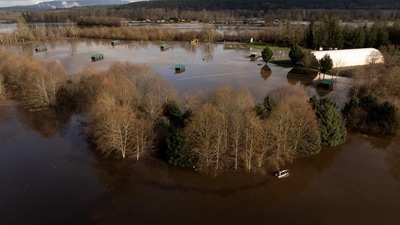 Several members of the Washington National Guard are being dispatched to support communities preparing for further river surges. (REUTERS)