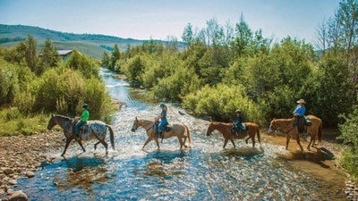 A horseback-riding excursion at C Lazy U Ranch in Colorado. A horseback-riding excursion at C Lazy U Ranch in Colorado.