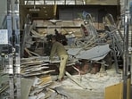 A worker cleans up inside a commercial facility in Hachinohe in Aomori Prefecture, northeastern Japan December 9, 2025, following a strong earthquake.