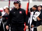 Head coach Kyle Whittingham of the Utah Utes watches his team against the Kansas Jayhawks Head coach Kyle Whittingham of the Utah Utes watches his team against the Kansas Jayhawks