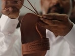 The collection of Kolhapuri sandals will feature 2,000 pairs, debuting in February 2026, and includes a training program for artisans to enhance their skills.