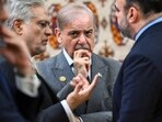 Pakistani Prime Minister Shehbaz Sharif waits before a meeting with Russian President Vladimir Putin in Ashgabat, Turkmenistan.