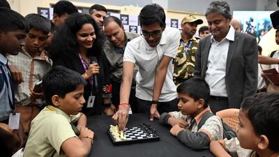 India’s chess grandmaster R Praggnanandhaa playing chess with school students at the Dharavi Sports Complex in Mumbai on Friday. (Raju Shinde/HT Photo) India’s chess grandmaster R Praggnanandhaa playing chess with school students at the Dharavi Sports Complex in Mumbai on Friday. (Raju Shinde/HT Photo)