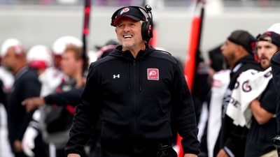 Head coach Kyle Whittingham of the Utah Utes watches his team against the Kansas Jayhawks (Getty Images via AFP) Head coach Kyle Whittingham of the Utah Utes watches his team against the Kansas Jayhawks (Getty Images via AFP)