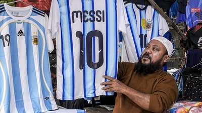 Football icon Lionel Messi is all set to arrive in Kolkata on December 13 as a part of his G.O.A.T India Tour 2025. The City of Joy is gearing up to welcome the legend, which is a dream come true for many football fans. Shops are selling the iconic number 10 jersey. (PTI/Manvender Vashist Lav) Football icon Lionel Messi is all set to arrive in Kolkata on December 13 as a part of his G.O.A.T India Tour 2025. The City of Joy is gearing up to welcome the legend, which is a dream come true for many football fans. Shops are selling the iconic number 10 jersey. (PTI/Manvender Vashist Lav)