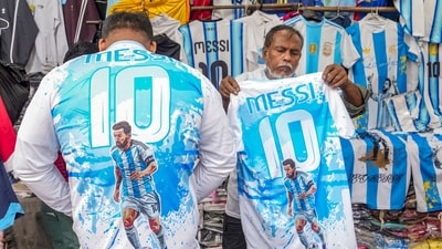Vendors across the city are selling merchandise, such as colourful shirts featuring his image and jersey number. (PTI) Vendors across the city are selling merchandise, such as colourful shirts featuring his image and jersey number. (PTI)