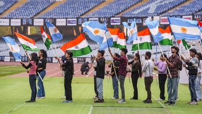 Rehearsals are being held at Vivekananda Yuba Bharati Krirangan Stadium. Volunteers are seen waving Indian and Argentinian flags. (PTI Photo/Swapan Mahapatra) Rehearsals are being held at Vivekananda Yuba Bharati Krirangan Stadium. Volunteers are seen waving Indian and Argentinian flags. (PTI Photo/Swapan Mahapatra)