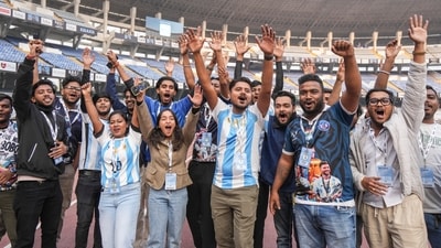 On the eve of Lionel Messi's 'GOAT Tour India 2025' at the Vivekananda Yuba Bharati Krirangan stadium in Kolkata, fans cheer. (PTI Photo/Swapan Mahapatra) On the eve of Lionel Messi's 'GOAT Tour India 2025' at the Vivekananda Yuba Bharati Krirangan stadium in Kolkata, fans cheer. (PTI Photo/Swapan Mahapatra)