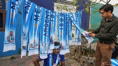 Other than shirts, scarves are also being sold for enthusiastic fans awaiting his arrival. (PTI) Other than shirts, scarves are also being sold for enthusiastic fans awaiting his arrival. (PTI)