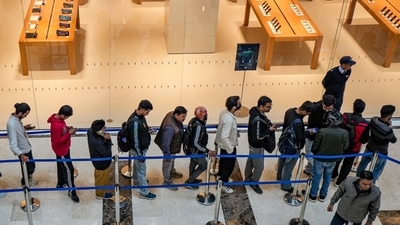 People wait in a queue ahead of the inauguration of the new Apple store, in Noida Sector 18, Gautam Buddh Nagar on Thursday. (PTI) People wait in a queue ahead of the inauguration of the new Apple store, in Noida Sector 18, Gautam Buddh Nagar on Thursday. (PTI)