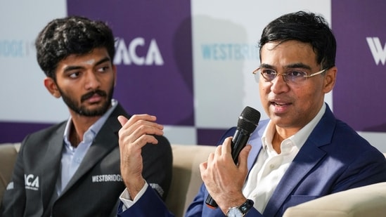 World Chess Champion D Gukesh, left, with former world chess champion Viswanathan Anand during a press conference. (PTI)