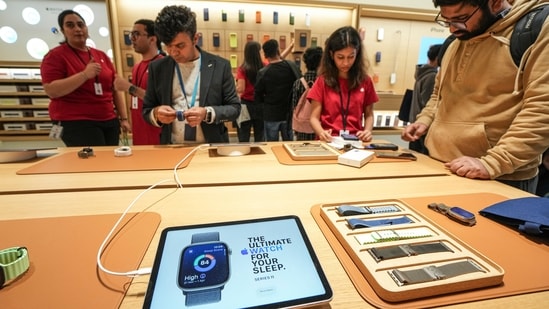 New Apple products on display during the launch of the company's new store, in Noida, DLF Mall of India.(PTI)
