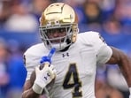 FILE - Notre Dame running back Jeremiyah Love (4) had estimated NIL earnings of $1.6 million this year. FILE - Notre Dame running back Jeremiyah Love (4) had estimated NIL earnings of $1.6 million this year.
