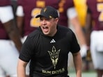 Arizona State head coach Kenny Dillingham encourages his players prior to an NCAA college football game against West Virginia