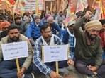 Leaders from power unions protest in Patiala on Friday. (HT Photo)
