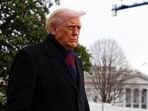 U.S. President Donald Trump looks on before departing for the Army/Navy football game in Baltimore, at the White House in Washington, D.C., U.S., December 13, 2025. REUTERS/Aaron Schwartz