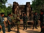 Cambodia says Thai jets bombed targets hours after Trump announced truce. A Cambodian soldier (centre L) shakes hands with a Thai soldier (centre R) at the disputed ancient Khmer temple Prasat Ta Muen Thom, or Prasat Ta Moan Thom in Khmer, on the Cambodian-Thai border in Oddar Meanchey province on March 26, 2025. Cambodia says Thai jets bombed targets hours after Trump announced truce. A Cambodian soldier (centre L) shakes hands with a Thai soldier (centre R) at the disputed ancient Khmer temple Prasat Ta Muen Thom, or Prasat Ta Moan Thom in Khmer, on the Cambodian-Thai border in Oddar Meanchey province on March 26, 2025.