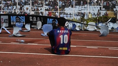 A fan looks on as chaos reigns supreme inside the Salt Lake Stadium. There was no sense of control as the Messi supporters continued to vandalise property and hurl whatever they could spot. (HT Photo) A fan looks on as chaos reigns supreme inside the Salt Lake Stadium. There was no sense of control as the Messi supporters continued to vandalise property and hurl whatever they could spot. (HT Photo)