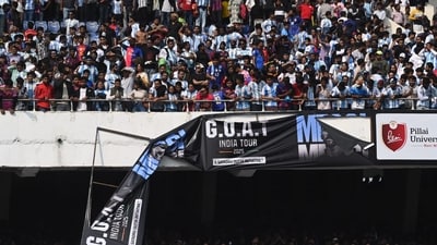 Messi had earlier waved to the crowd amid deafening cheers before being involved in a quick meet-and-greet session with the former Indian footballers who were involved in an exhibition match between Mohun Bagan 'Messi' All Stars and Diamond Harbour 'Messi' All Stars. However, once he felt, the fans started to remove posters and make their anger known to the world. (HT Photo ) Messi had earlier waved to the crowd amid deafening cheers before being involved in a quick meet-and-greet session with the former Indian footballers who were involved in an exhibition match between Mohun Bagan 'Messi' All Stars and Diamond Harbour 'Messi' All Stars. However, once he felt, the fans started to remove posters and make their anger known to the world. (HT Photo )