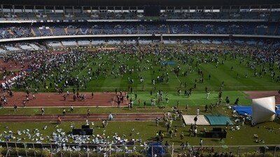 Apart from vandalising property, the fans also threw water bottles to the middle after the supporters were left frustrated on not getting enough change to see Messi up close and personal. (HT Photo ) Apart from vandalising property, the fans also threw water bottles to the middle after the supporters were left frustrated on not getting enough change to see Messi up close and personal. (HT Photo )