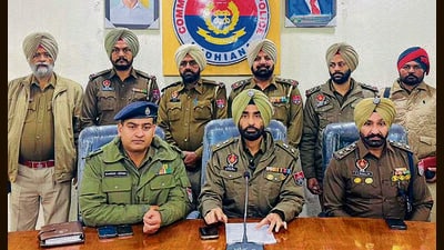 DCP Rupinder Singh with other officials giving details about the arrest during a media conference in Ludhiana on Saturday. (HT Photo) DCP Rupinder Singh with other officials giving details about the arrest during a media conference in Ludhiana on Saturday. (HT Photo)