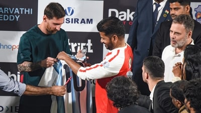 Telangana Chief Minister Revanth Reddy presents a jersey to Lionel Messi. (PTI) Telangana Chief Minister Revanth Reddy presents a jersey to Lionel Messi. (PTI)