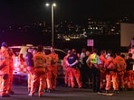 Emergency services workers gather at the scene after a shooting incident at Bondi Beach in Sydney on December 14, 2025.&nbsp;