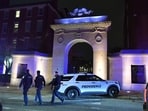 Law enforcement officials walk near an entrance to Brown University in Providence, R.I., on Saturday, Dec. 13, 2025, during the investigation of a shooting. Law enforcement officials walk near an entrance to Brown University in Providence, R.I., on Saturday, Dec. 13, 2025, during the investigation of a shooting.