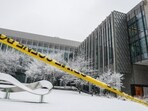 Police caution tape surrounds Brown University's Barus and Holley building Sunday, Dec. 14, 2025, after a shooting on Saturday in Providence. Police caution tape surrounds Brown University's Barus and Holley building Sunday, Dec. 14, 2025, after a shooting on Saturday in Providence.