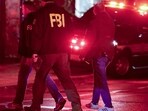 Emergency personnel gather on Waterman Street at Brown University in Providence, R.I., on Saturday, Dec. 13, 2025, during the investigation of a shooting. (AP Photo/Mark Stockwell) Emergency personnel gather on Waterman Street at Brown University in Providence, R.I., on Saturday, Dec. 13, 2025, during the investigation of a shooting. (AP Photo/Mark Stockwell)