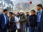 Jammu and Kashmir chief minister Omar Abdullah interacting with people during the inauguration of Asia’s longest ski drag lift project in Gulmarg, Baramulla, on Saturday. (PTI)