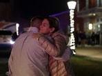 People hug outside the Nelson Fitness Center after Brown University was locked down amid reports of a shooting on campus in Providence, Rhode Island, U.S. December 13, 2025. REUTERS/Taylor Coester(REUTERS)
