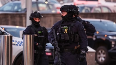 Armed police work at the scene after a shooting incident at Bondi Beach in Sydney on December 14, 2025. (Photo by DAVID GRAY / AFP) (AFP) Armed police work at the scene after a shooting incident at Bondi Beach in Sydney on December 14, 2025. (Photo by DAVID GRAY / AFP) (AFP)