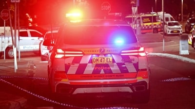 Police work at the scene after a shooting incident at Bondi Beach in Sydney on December 14, 2025. Two gunmen opened fire at Sydney's Bondi Beach on December 14, killing at least 12 people and wounding multiple others in a "terrorist incident" during a gathering for the Jewish festival of Hanukkah. (Photo by Saeed KHAN / AFP) (AFP) Police work at the scene after a shooting incident at Bondi Beach in Sydney on December 14, 2025. Two gunmen opened fire at Sydney's Bondi Beach on December 14, killing at least 12 people and wounding multiple others in a "terrorist incident" during a gathering for the Jewish festival of Hanukkah. (Photo by Saeed KHAN / AFP) (AFP)