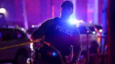 A police officer hangs yellow crime tape at Brown University in Providence, R.I., on Saturday, Dec. 13, 2025, during the investigation of a shooting. (AP Photo/Mark Stockwell) (AP) A police officer hangs yellow crime tape at Brown University in Providence, R.I., on Saturday, Dec. 13, 2025, during the investigation of a shooting. (AP Photo/Mark Stockwell) (AP)