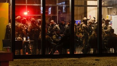 Police S.W.A.T. team members gather inside Brown University's Sciences Library after a shooting Saturday, Dec. 13, 2025, in Providence, R.I. (Lily Speredelozzi/The Sun Chronicle via AP) (AP) Police S.W.A.T. team members gather inside Brown University's Sciences Library after a shooting Saturday, Dec. 13, 2025, in Providence, R.I. (Lily Speredelozzi/The Sun Chronicle via AP) (AP)