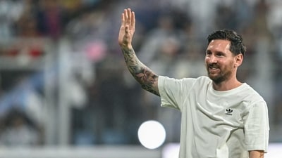 Lionel Messi was continuously cheered by fans as he made his way around Wankhede Stadium, taking time to acknowledge and greet them along the route. (AFP)