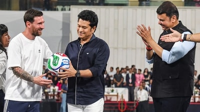 Lionel Messi also presented a football to cricket great Sachin Tendulkar after receiving the jersey from him. (PTI)