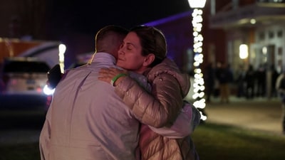 People hug outside the Nelson Fitness Center after Brown University was locked down amid reports of a shooting on campus in Providence, Rhode Island, U.S. December 13, 2025.  REUTERS/Taylor Coester (REUTERS)