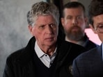 Daniel McKee, Governor of Rhode Island looks on during a press conference near the campus of Brown University