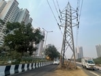 Officials flagged the pole as accident-prone during fog and peak hours, while residents say visibility issues have worsened traffic on the busy road. (Parveen Kumar/HT)