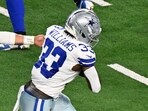 Dallas Cowboys quarterback Dak Prescott hands off to running back Javonte Williams, before Williams scores a touchdown during the first half vs Vikings.