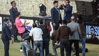 Messi kicks a football to the crowd. (Naveen Sharma) Messi kicks a football to the crowd. (Naveen Sharma)