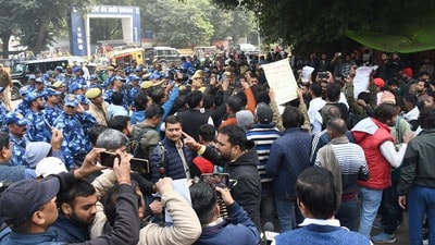 The protest outside the gate of UPPSC headquarters in Prayagraj on Monday afternoon. (HT Photo) The protest outside the gate of UPPSC headquarters in Prayagraj on Monday afternoon. (HT Photo)
